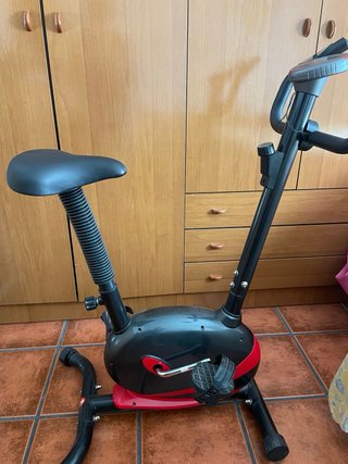 Bicicleta Estática Negra y roja totalmente nueva.