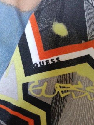 Pantalones cortos Guess multicolor niño 12años