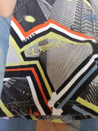 Pantalones cortos Guess multicolor niño 12años
