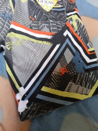 Pantalones cortos Guess multicolor niño 12años