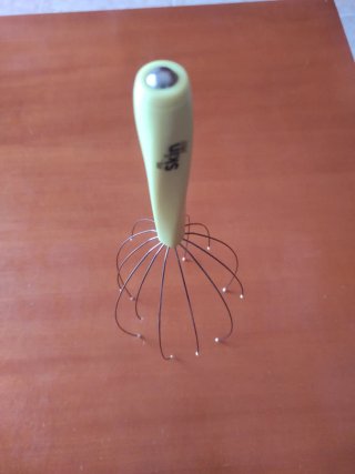 Masajeador de cabeza manual