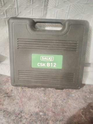 Carrete de cable y eje de transmisión