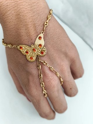 ORO NUEVO 18KT Manita niña Mariposa Circonitas