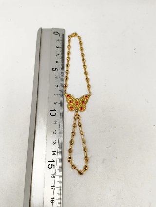 ORO NUEVO 18KT Manita niña Mariposa Circonitas