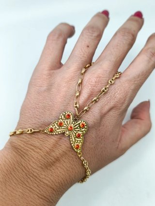 ORO NUEVO 18KT Manita niña Mariposa Circonitas