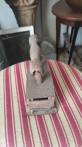 Plancha antigua de carbón