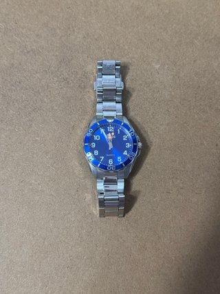 Reloj Lotus Plateado con esfera azul