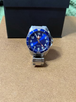 Reloj Lotus Plateado con esfera azul