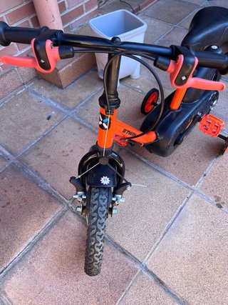 Bicicleta B'Twin infantil con ruedines