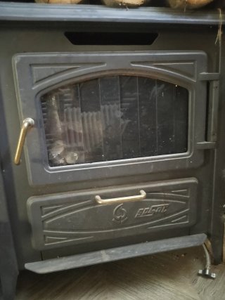 Chimenea Gasoil Negra con Puerta Cristal