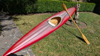 Piragua de fibra de vidrio para aguas tranquilas