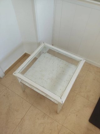 Mesa de centro de cristal y madera