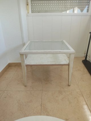 Mesa de centro de cristal y madera