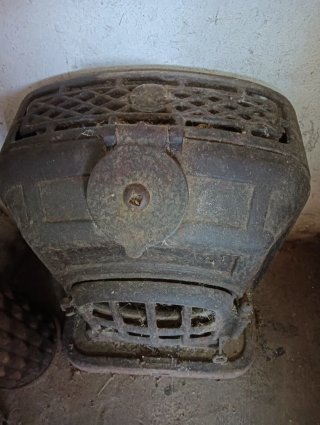 Estufa Escalfa panxes antigua