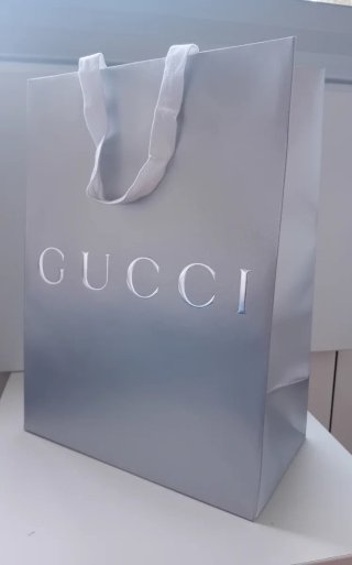 Bolsa de regalo Gucci gris