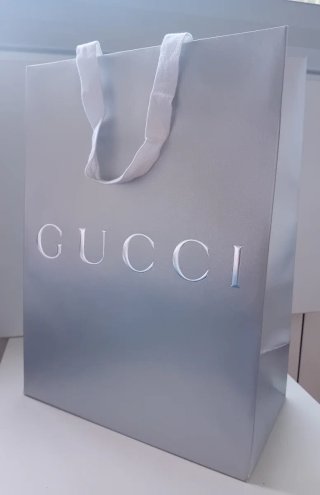 Bolsa de regalo Gucci gris