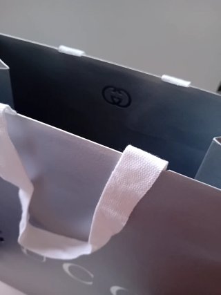 Bolsa de regalo Gucci gris