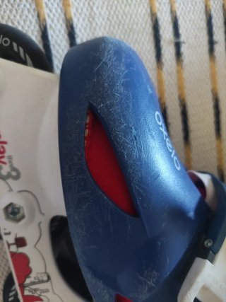 Casco Oxelo blanco y patines talla 34-36