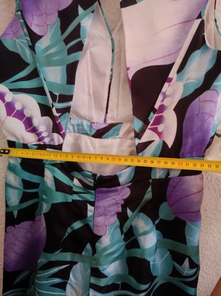 Mono floral morado y turquesa