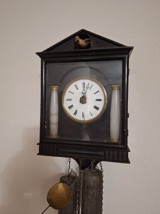 Reloj de péndulo antiguo