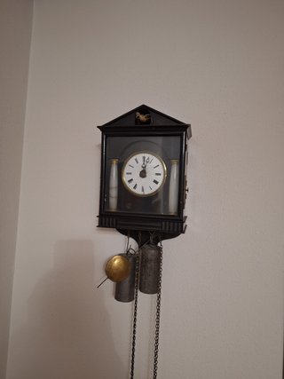 Reloj de péndulo antiguo
