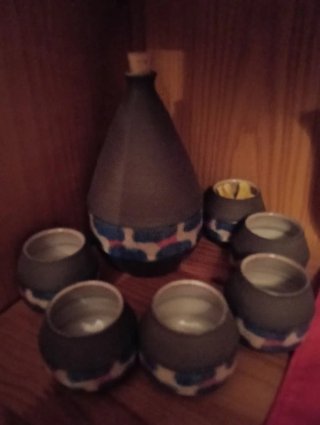 Jarra y 6 vasos de cerámica