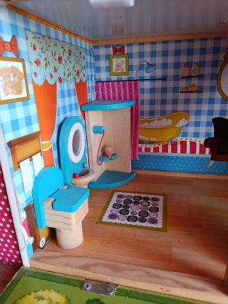 Casita de madera para muñecas