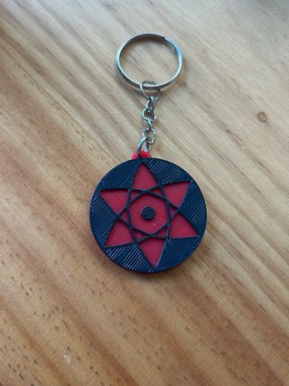 Llavero Mangekyou Sharingan Sasuke Uchiha