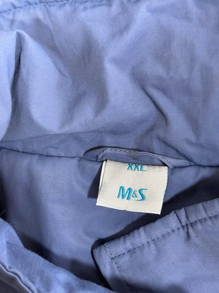 Chaleco azul con cremallera