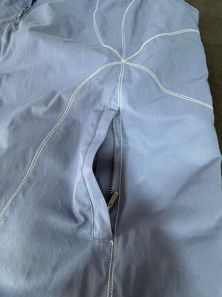 Chaleco azul con cremallera
