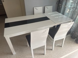Mesa de comedor moderna blanca y negra mas sillas