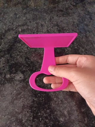 Soporte para móvil junto a cargador