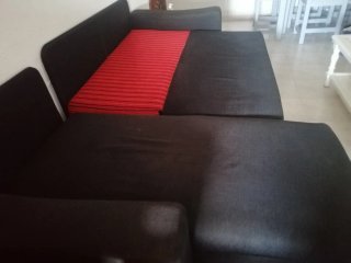 Sofá cama chaise longue con cojines