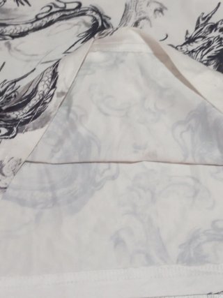 Top manga larga estampado dragones