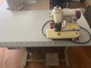 Máquina de coser puntada invisible