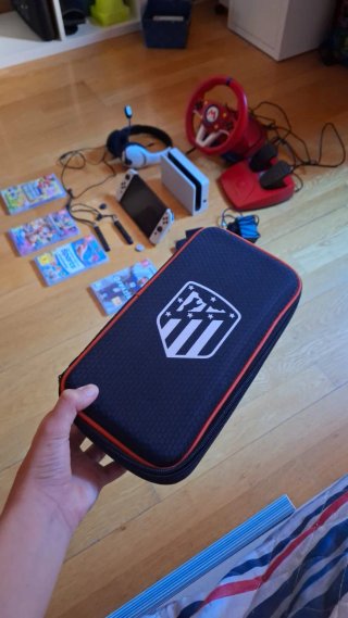 Nintendo Switch + 4 Giochi + Volante e cuffie