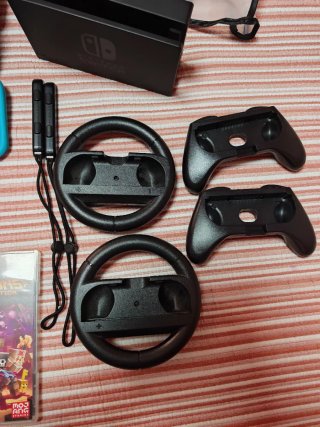 Nintendo Switch + 2 Joy-Con + 3 juegos +accesorios
