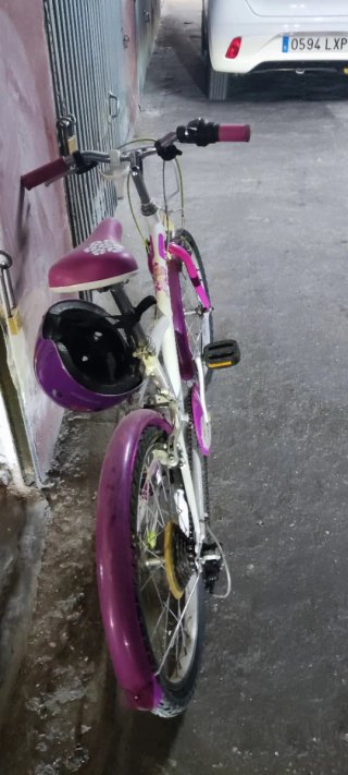 Bicicleta infantil Btwin rosa y blanca