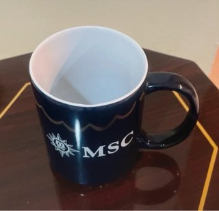 Taza MSC azul de cerámica