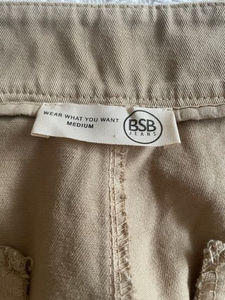 Pantalones beige talle alto pata ancha
