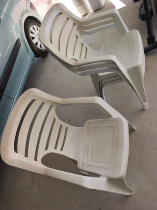 Sillas de plástico apilables blancas