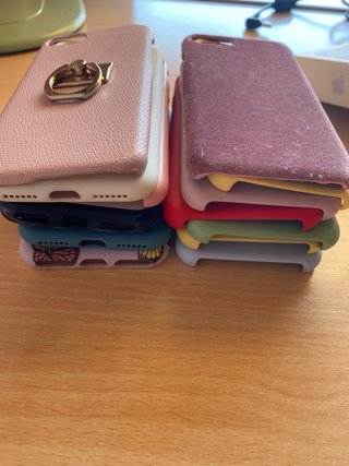 iPhone 7 Rosa con 14 fundas y cargador precintado