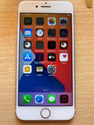 iPhone 7 Rosa con 14 fundas y cargador precintado