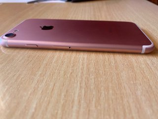 iPhone 7 Rosa con 14 fundas y cargador precintado