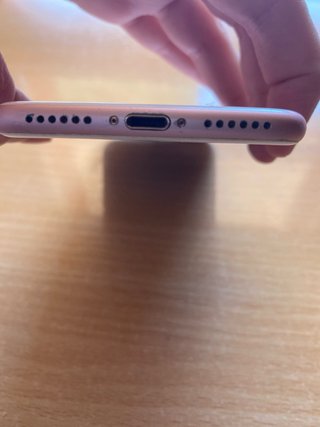 iPhone 7 Rosa con 14 fundas y cargador precintado