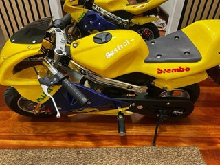 Moto infantil amarilla nueva