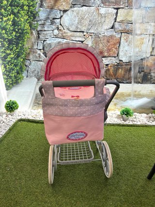 Carrito de muñecas rosa vintage