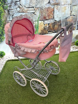 Carrito de muñecas rosa vintage