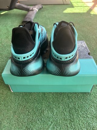 Zapatillas Under Armour Negras y Turquesa