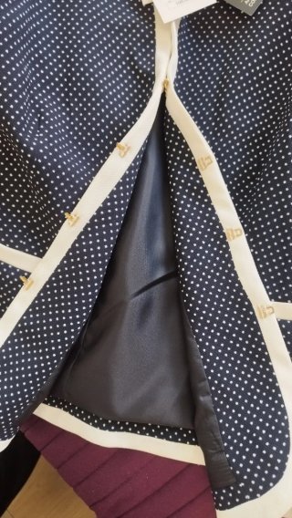 Chaqueta azul marino con topos blancos T.52